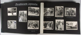 UNIQUE FULLY ANNOTATED PHOTO ALBUM WITH 718 SILVER GELATIN PRINTS AND 164 MEMORABILIA DOCUMENTING THE 6-MONTH VOLUNTARY SERVICE OF WILHELM HEYN, A GERMAN STAFF SERGEANT IN THE LEGION CONDOR DURING THE SPANISH CIVIL WAR (1936-1939)