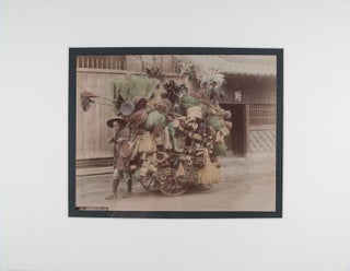 Item #44862 Basket Seller (Catalog No. 584). Nobokuni Enami, T. Enami, photographer